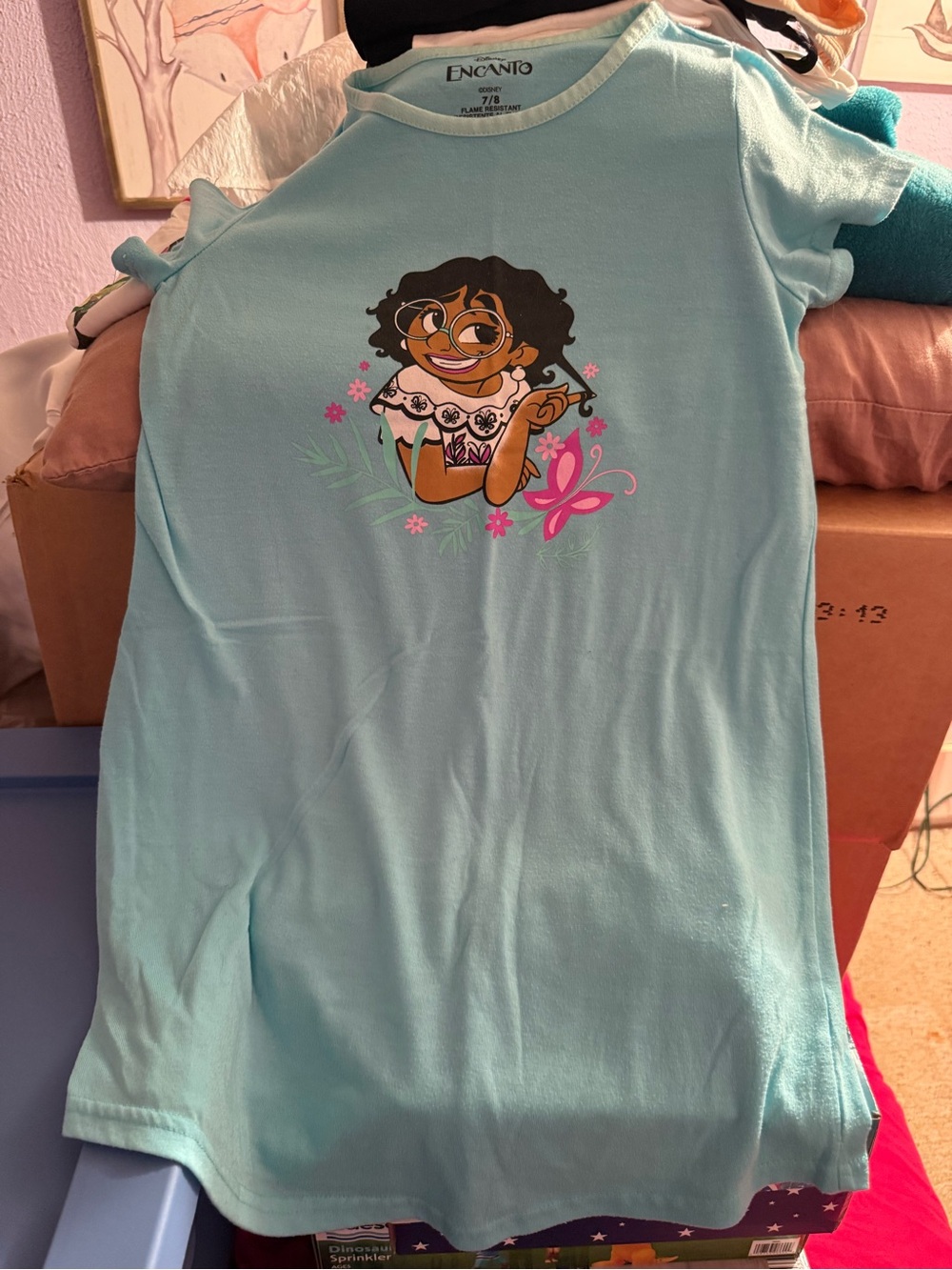 Disney Light Blue Encanto Character Tee with Pink & Green Print